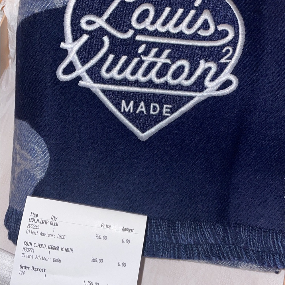 This is a Louis Vuitton scarf brand new never been worn blue and gray